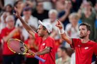 | Photo: AP/Manu Fernandez : Austin Krajicek and Rajeev Ram of the USA celebrate their victory